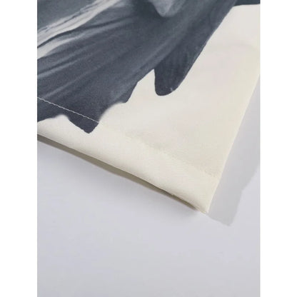 Shirt with an angel print, loose and casual fit, ideal for summer.