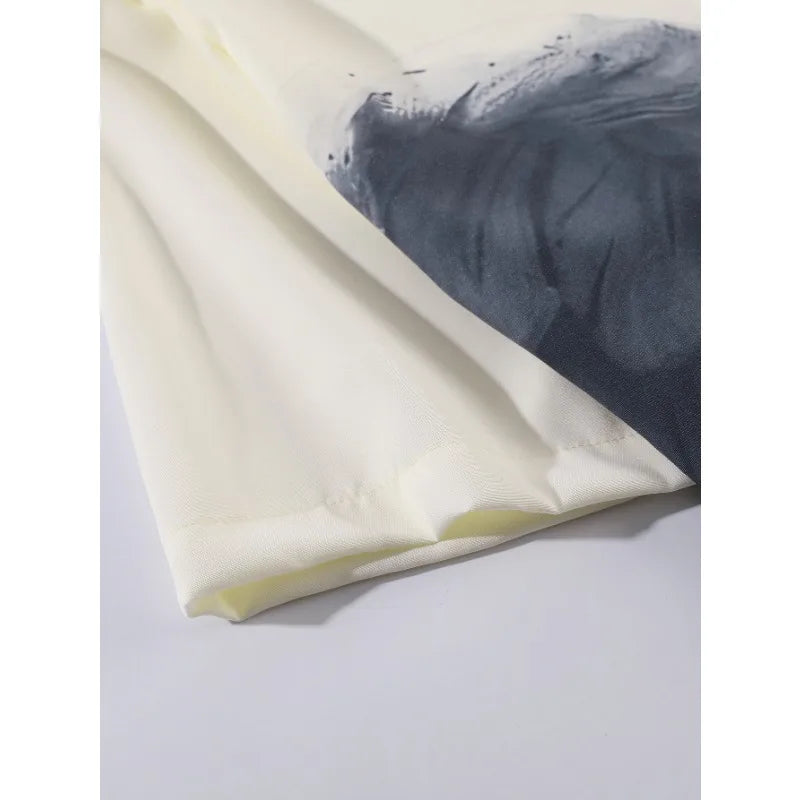 Shirt with an angel print, loose and casual fit, ideal for summer.