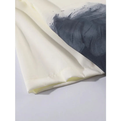 Shirt with an angel print, loose and casual fit, ideal for summer.